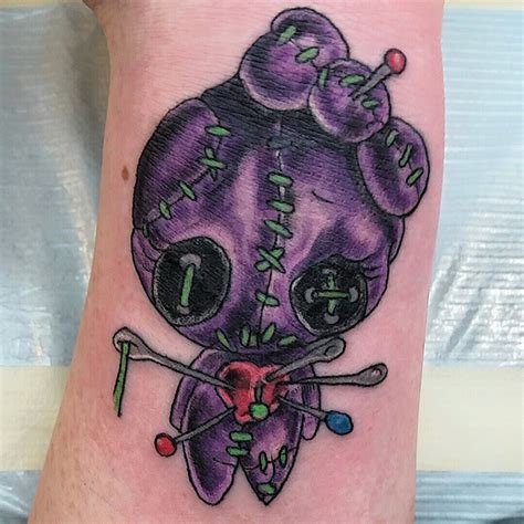 Voodoo Doll Tattoos and the Artistic Expression of Pain and Healing